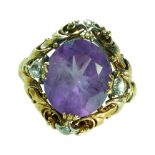 AN AMETHYST AND ROSE CUT DIAMOND RING, IN 14CT YELLOW GOLD.