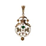 A 9CT GOLD PENDANT SET WITH SEED PEARLS.