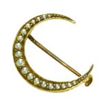 AN ANTIQUE SEED PEARLS CRESCENT BROOCH.
