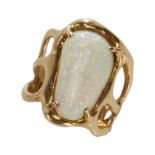 A BOLDER OPAL RING, IN YELLOW GOLD.