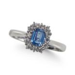 A SAPPHIRE AND DIAMOND CLUSTER RING, IN PLATINUM.