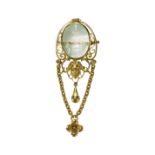 FRENCH, AN ANTIQUE ENGRAVED REVERSE ROCK CRYSTAL BROOCH, IN HIGH CARAT YELLOW GOLD.