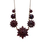 A BOHEMIAN GARNET NECKLACE, IN YELLOW GOLD.