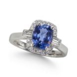 A TANZANITE AND DIAMOND CLUSTER RING, IN PLATINUM.