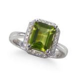 A PERIDOT AND DIAMOND CLUSTER RING, IN PLATINUM.