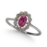 A CABOCHON RUBY AND DIAMOND RING, IN WHITE AND YELLOW GOLD.