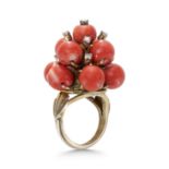 A CORAL AND DIAMOND RING, IN YELLOW GOLD.