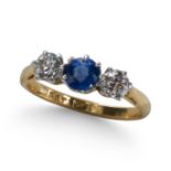 A SAPPHIRE AND DIAMOND THREE STONE RING, IN YELLOW AND PLATINUM.