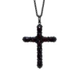 A VINTAGE GARNET CROSS PENDANT AND CHAIN, IN SILVER.