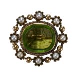 AN ANTIQUE PERIDOT AND PEARL BROOCH, IN YELLOW GOLD.