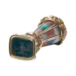 A FINE ANTIQUE SCOTTISH SEAL SET WITH A BLOODSTONE, IN YELLOW GOLD.