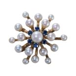 A PEARL AND SAPPHIRE SUB BURST BROOCH, IN YELLOW GOLD.