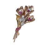 A RUBY AND DIAMOND FLOWER BROOCH, IN YELLOW AND ROSE GOLD.