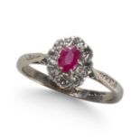 A RUBY AND DIAMOND CLUSTER RING, IN WHITE GOLD.