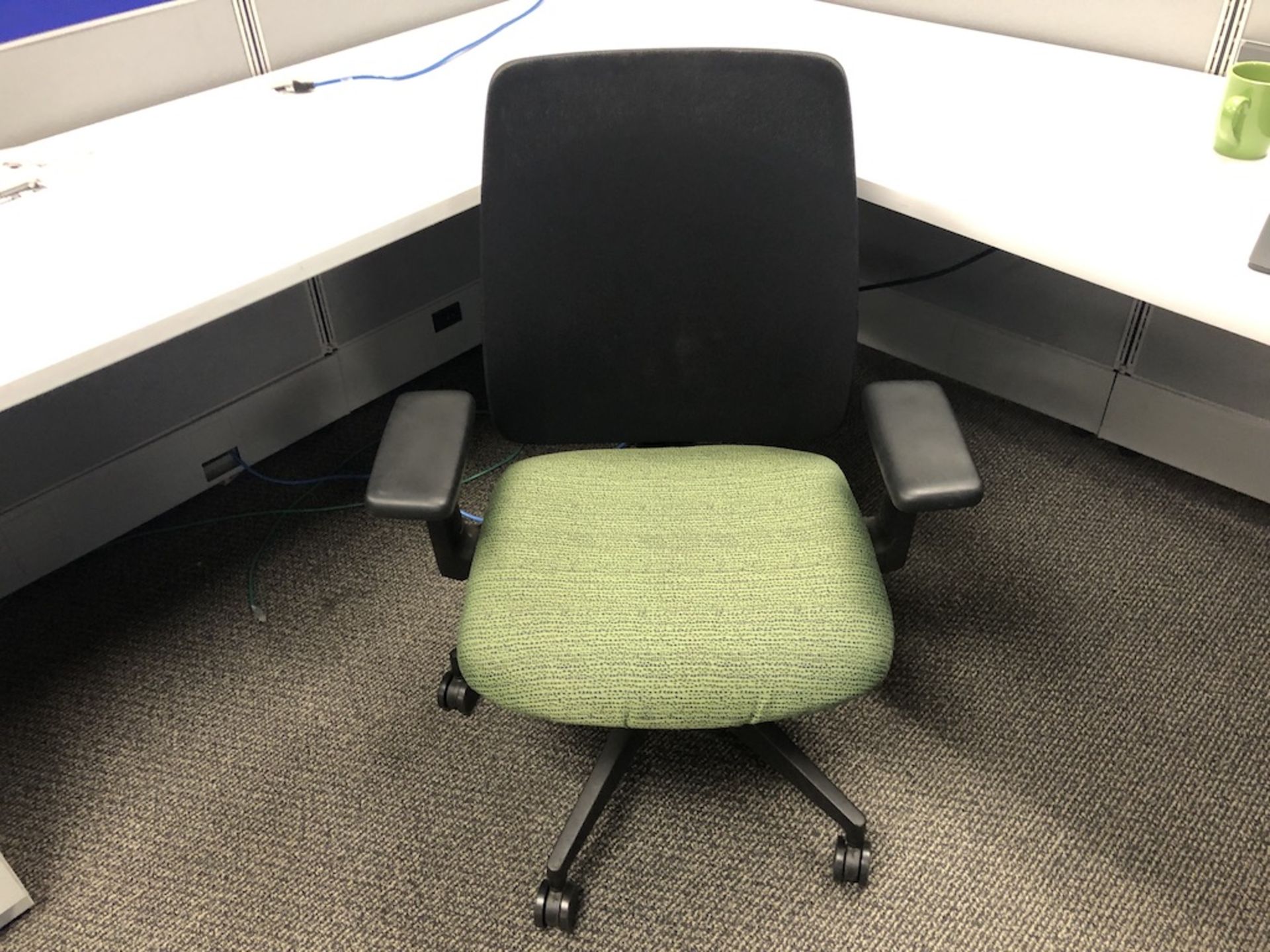5 CASTER OFFICE CHAIR PADDED ARM REST ( BOTH ARMS THE RUBBER COATING HAS SPLIT ), GREEN SEATED