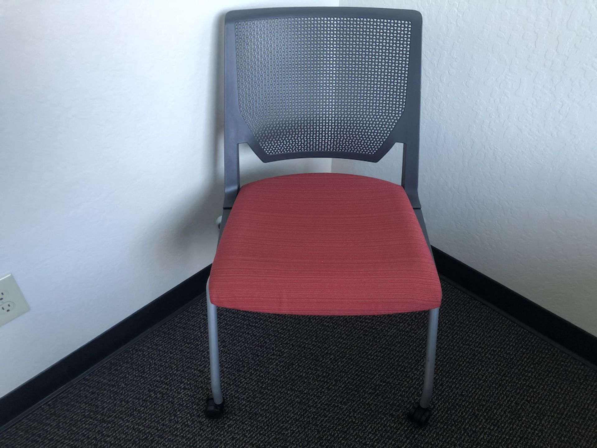 OFFICE CHAIR WITH RED CUSHIONED SEAT