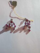 One 14K White gold diamond and ruby earrings