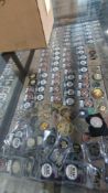 multiple collectible coins and challenge coins