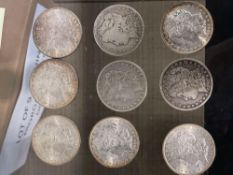 9 Morgan Silver dollars 1885, 1891, 1890, 1883, 1886