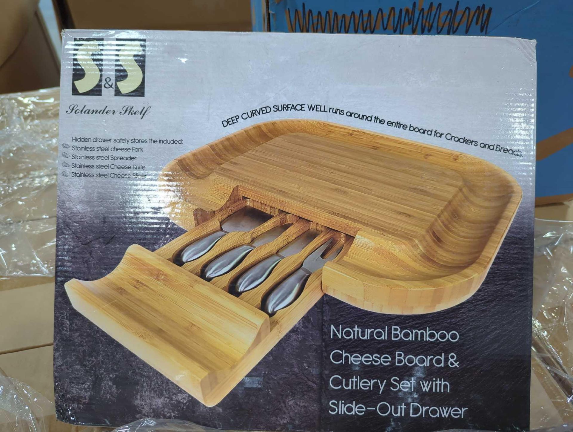 pallet of natural bamboo cheese board and cutlery set with slide out drawers