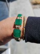 18k yellow gold 55.73ctw emerald berhl and 1.46 diamond bracelet