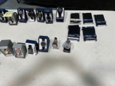 miscellaneous table a lot of watches Skechers Fossil armitron Bulova fossil and others