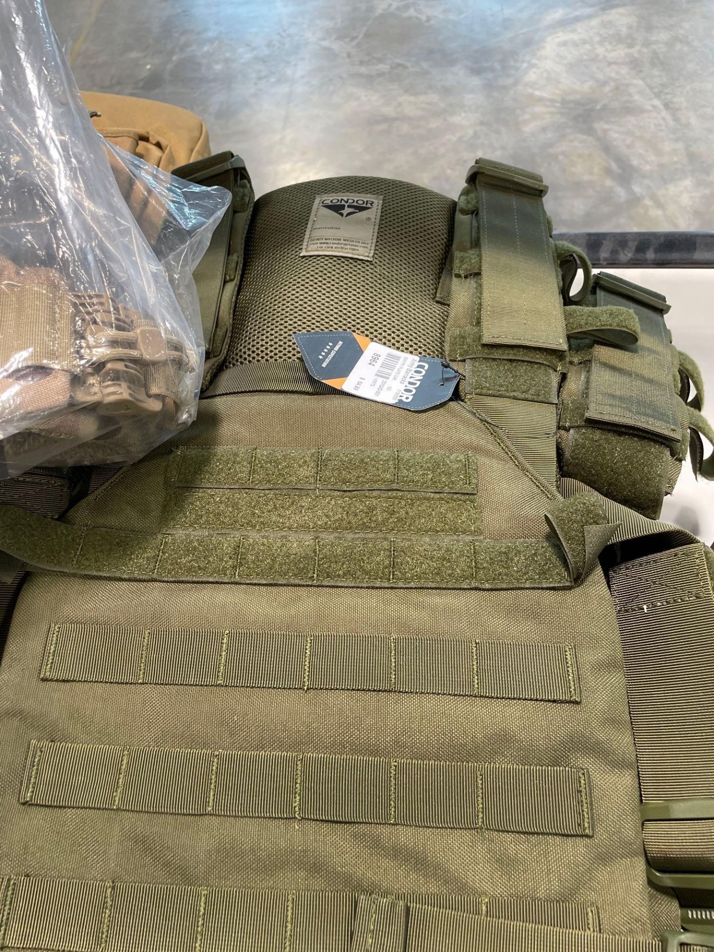 Shelf of Aglite backpacks, vests, Gun bags, Multiple Pellet guns and gun sand bags - Image 7 of 8