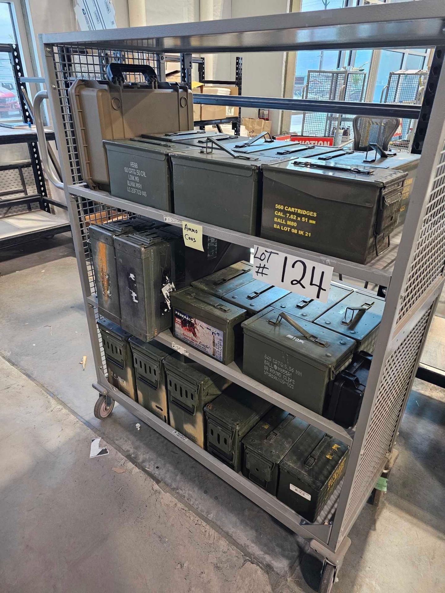 rolling rack of miscellaneous ammo cans