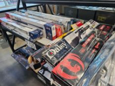 top shelf of miscellaneous air rifles