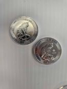 two 1.5 oz Canadian grizzly bears