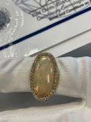14 karat yellow gold and opal diamond ring