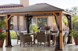 outdoor living 10x12 hardtop gazebo with wood grain console and outdoor sofa not in box