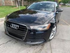 2015 Audi A6 Quattro: This car runs a bit rough, needs breaks, has faulty fuel injection system, has