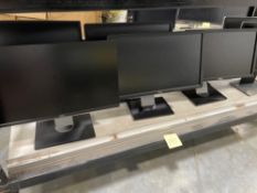bottom rack approximately 8 dell monitors with stands