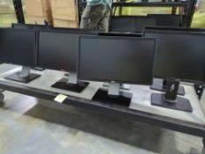 bottom rack approximately 8 dell monitors with stands