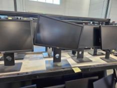top rack proximately 8 dell monitors with stands