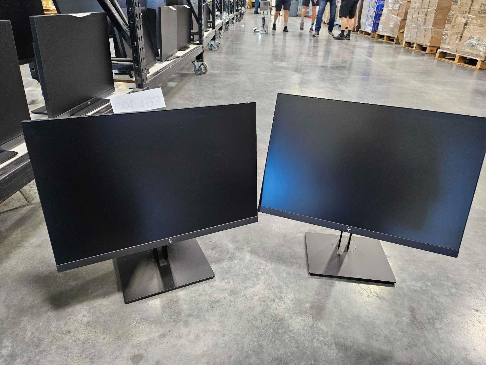 (2) HP z24" monitors with stands