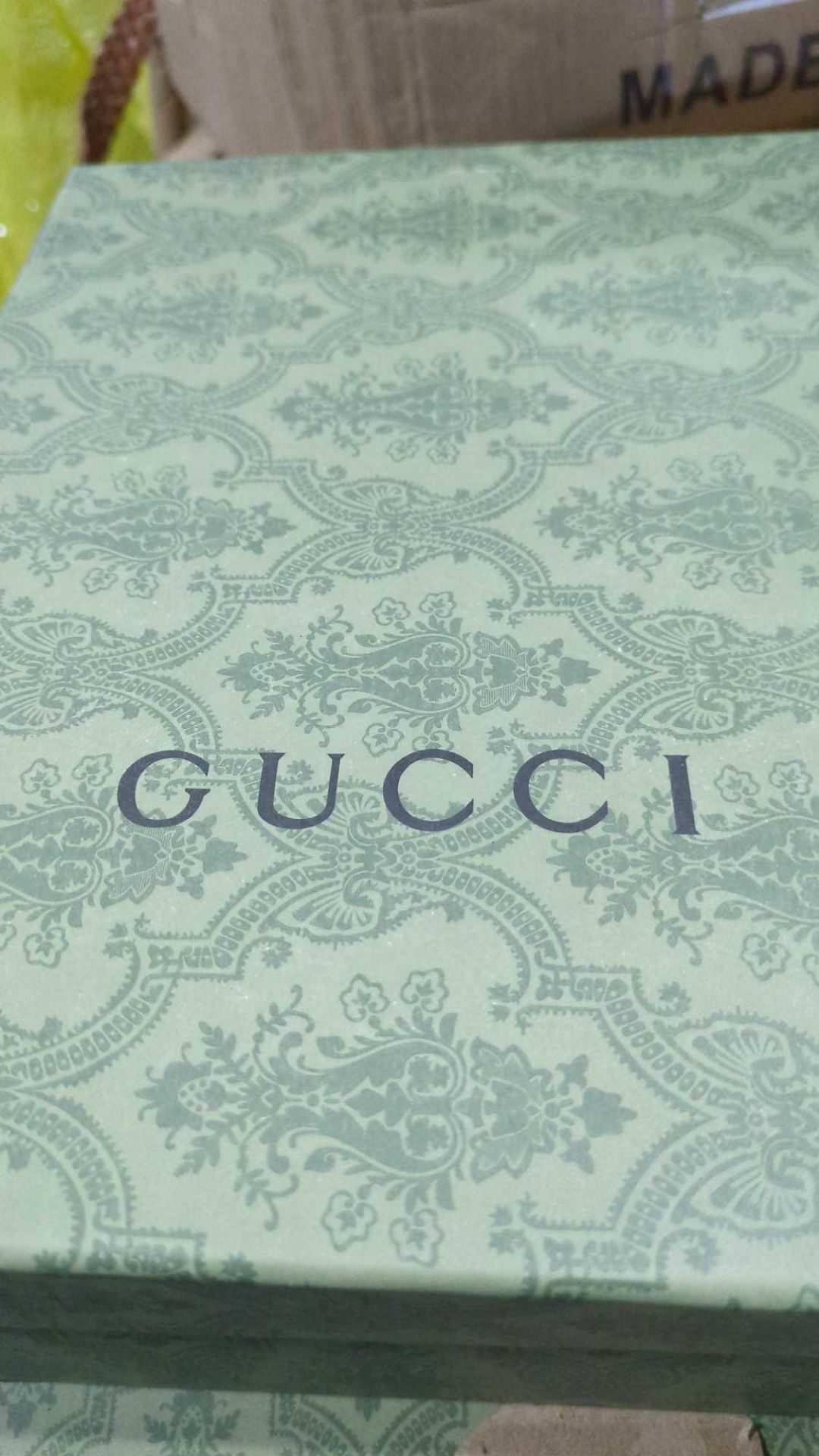 Pallet- Replica Gucci shoes, furniture piece, belts, hand lotions, turmeric body scrub, foam brick,