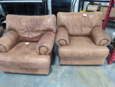 two brown leather chairs