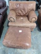 large brown leather chair and ottoman