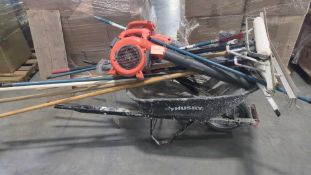 wheel barrow with yard tools and 2 blowers