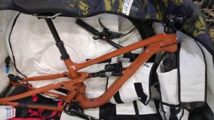 revel rascal mountain bike with dakine bike bag