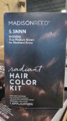 Rolling rack of health & beauty: garnier, my identity, madison reed color kit, interplak, burts bees