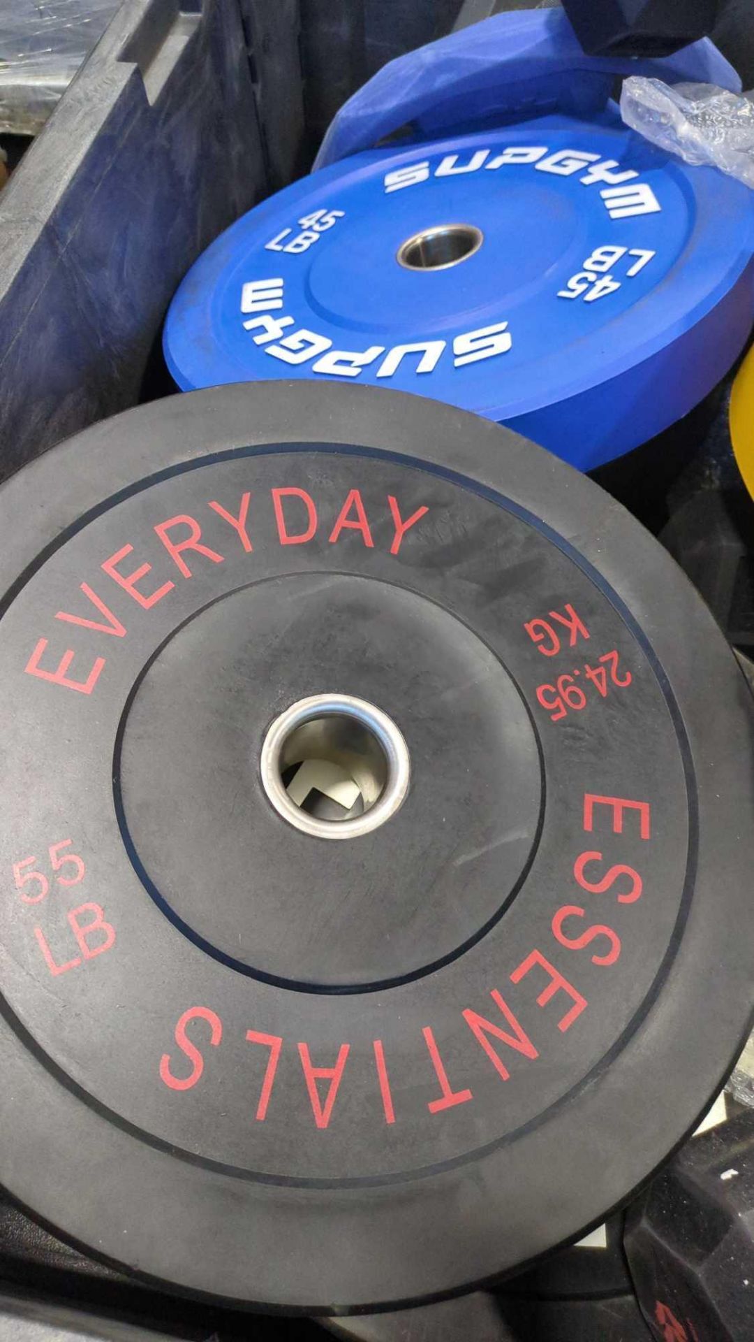 sleeve of weights, barbells and plates