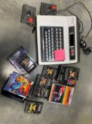 vintage Magnavox Odyssey 2. game system and games