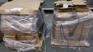 two pallets of cardboard inserts