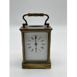 Antique Brass Carriage Clock with a key.