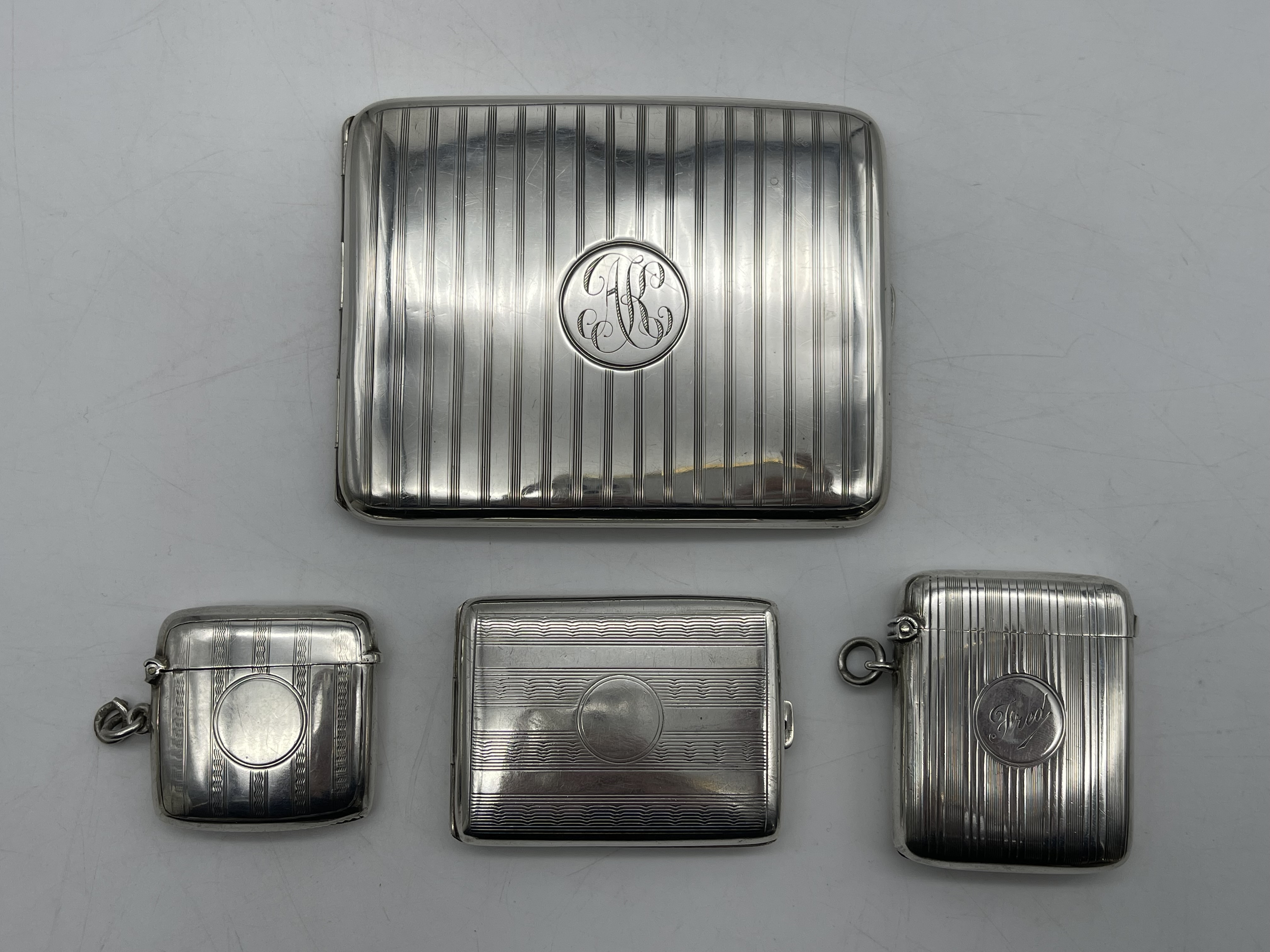 Hallmarked Silver Cigarette Case along with Three