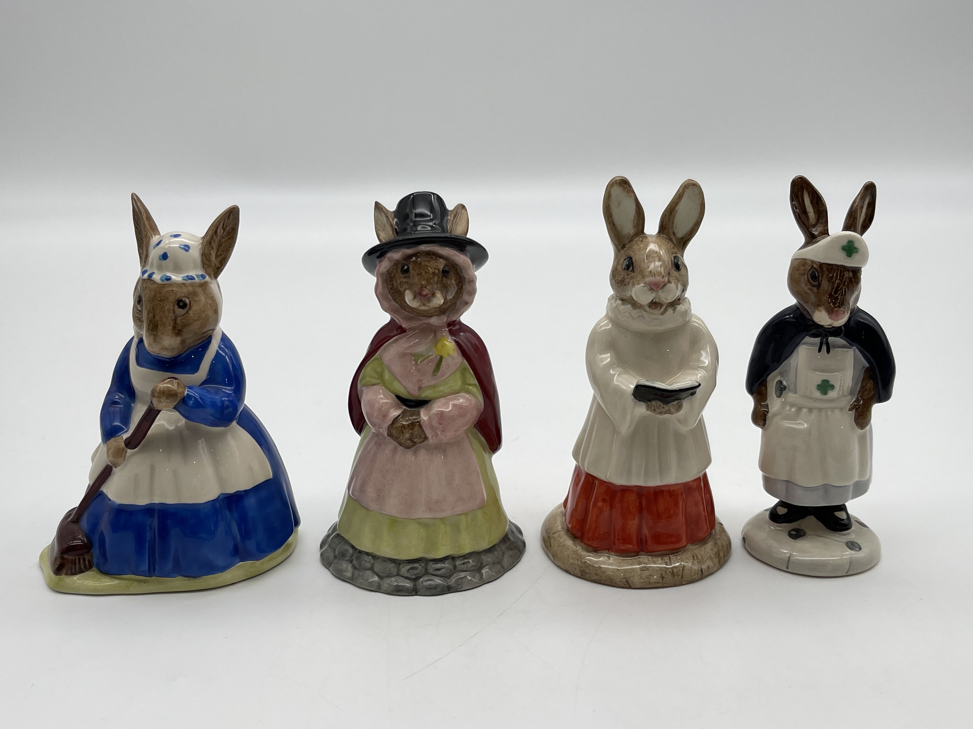 Four Royal Doulton Bunnykins to include Mrs. Bunny