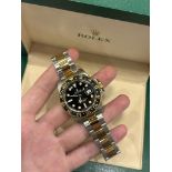 Rolex GMT Master II Steel & Yellow gold 116713LN -